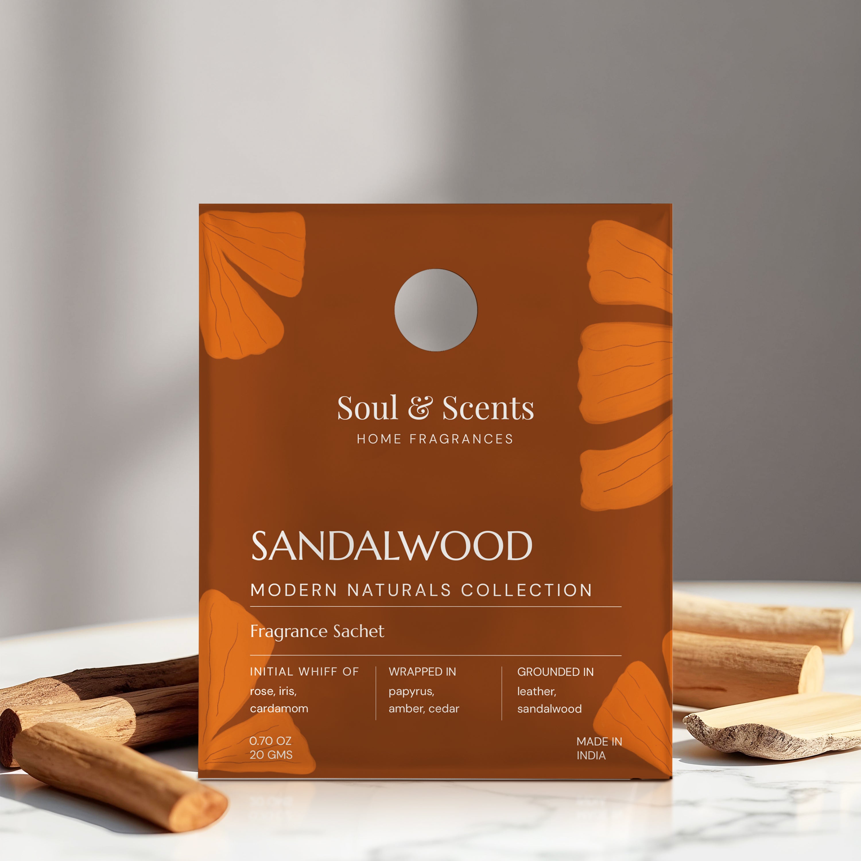 Sandalwood fragrance sachet packaging with 'Soul & Scents' branding on a neutral background.