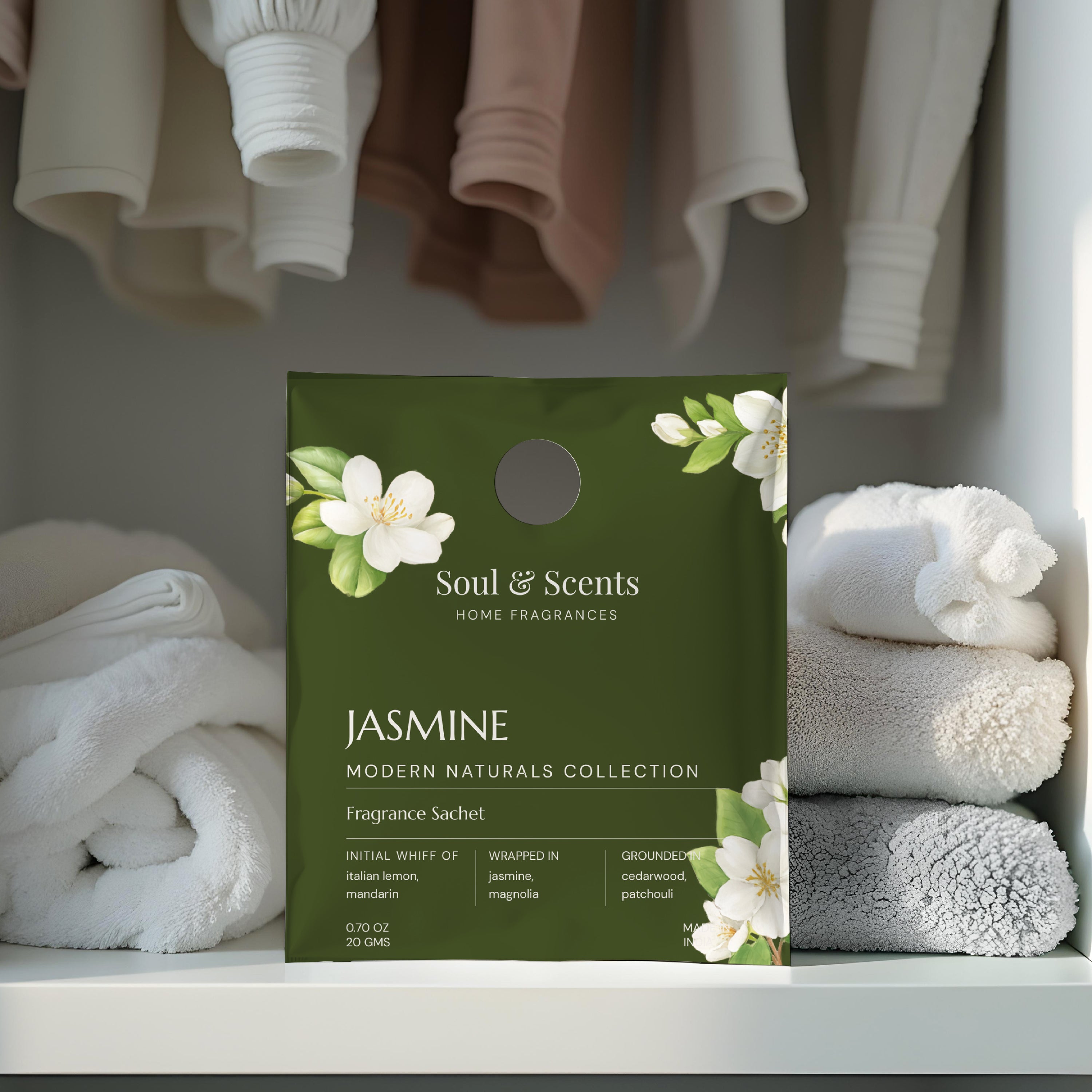 Soul & Scents Jasmine fragrance sachet packaging with folded towels in the background