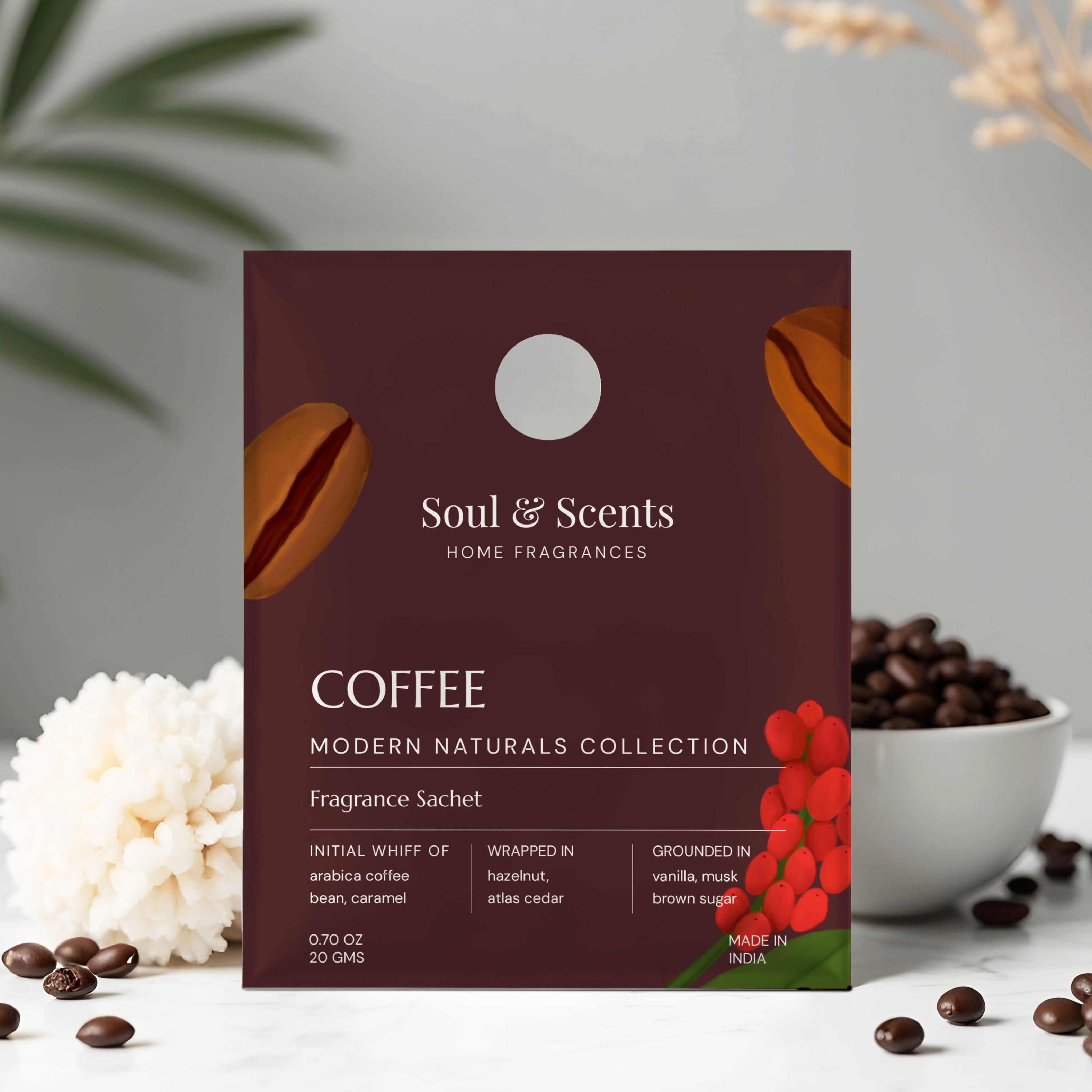 Soul & Scents coffee fragrance sachet with coffee beans and flowers on a neutral background