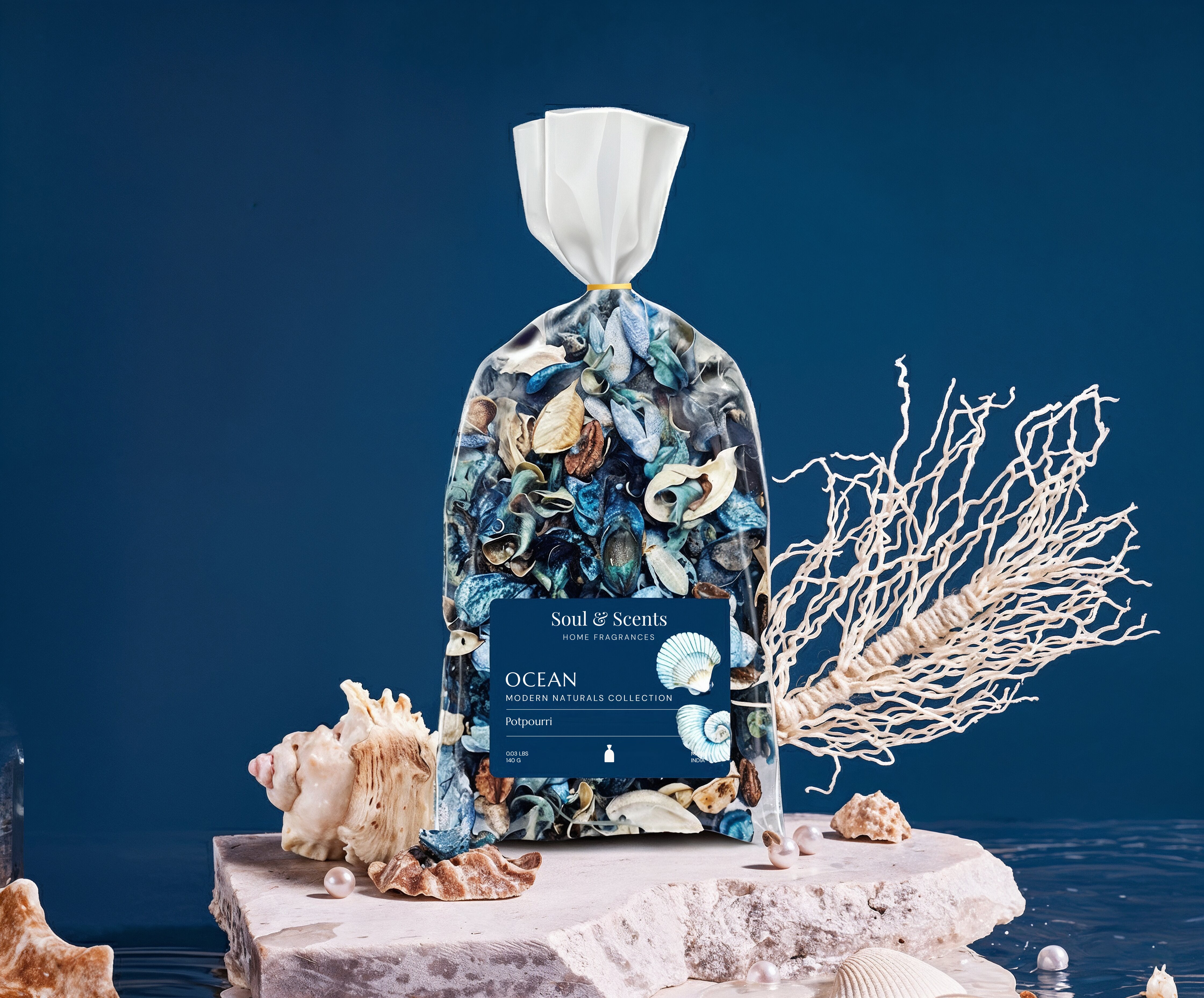 Decorative packaging labeled 'Soul & Scents' with ocean-themed elements on a dark blue background.