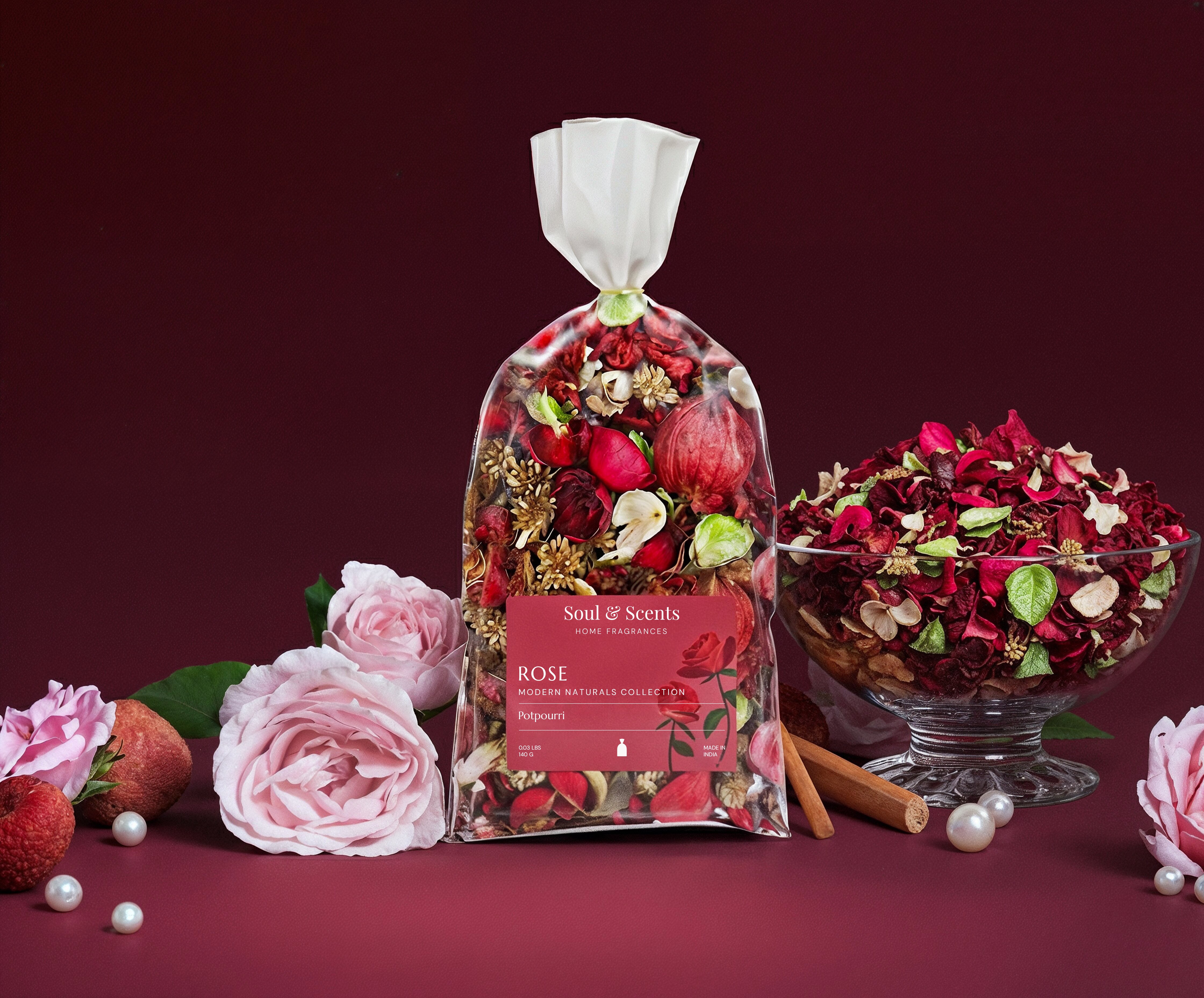 Packaged rose-flavored product with flowers and cinnamon sticks on a red background