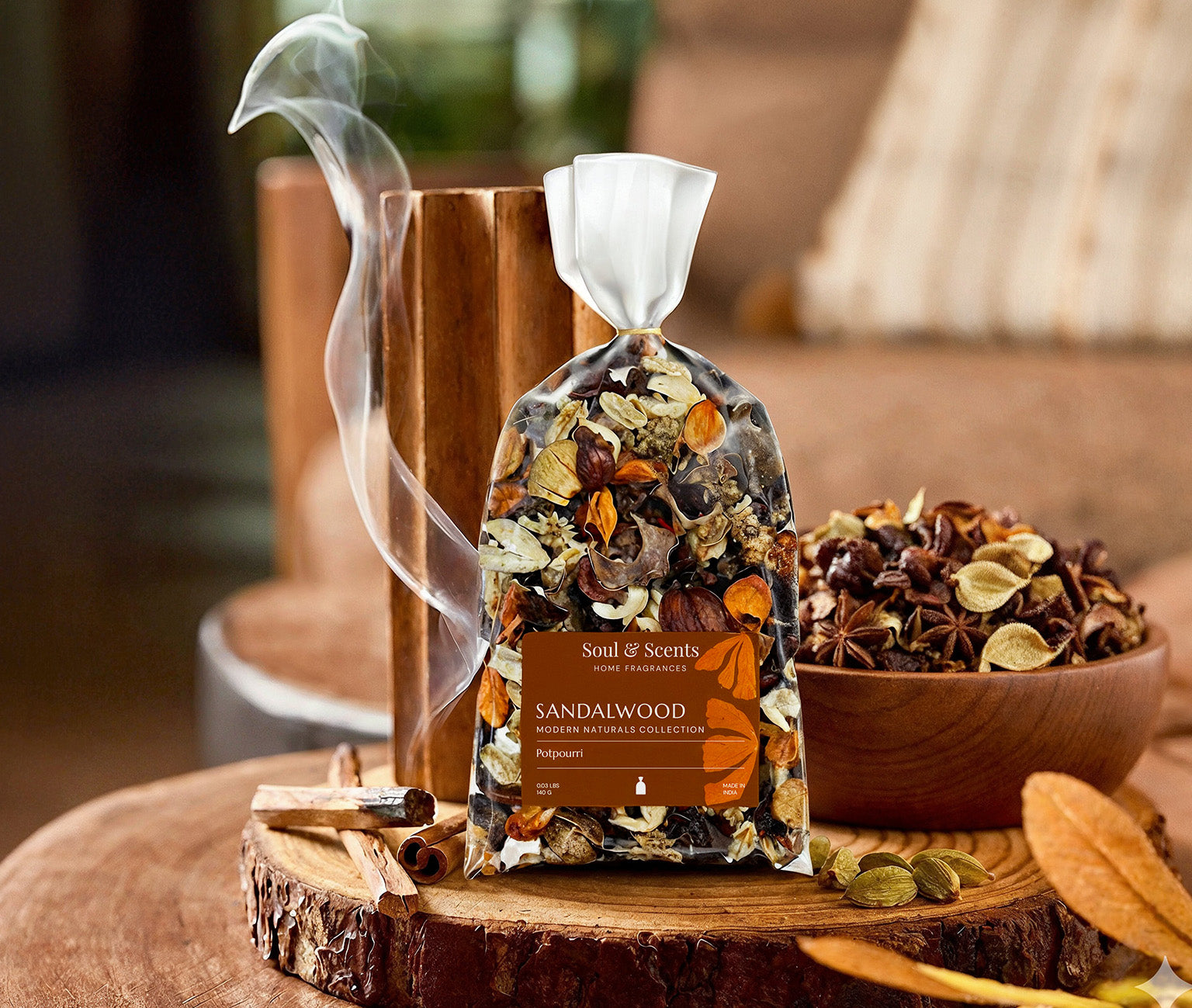 Sandalwood incense packaging with incense sticks and bowl on a wooden surface