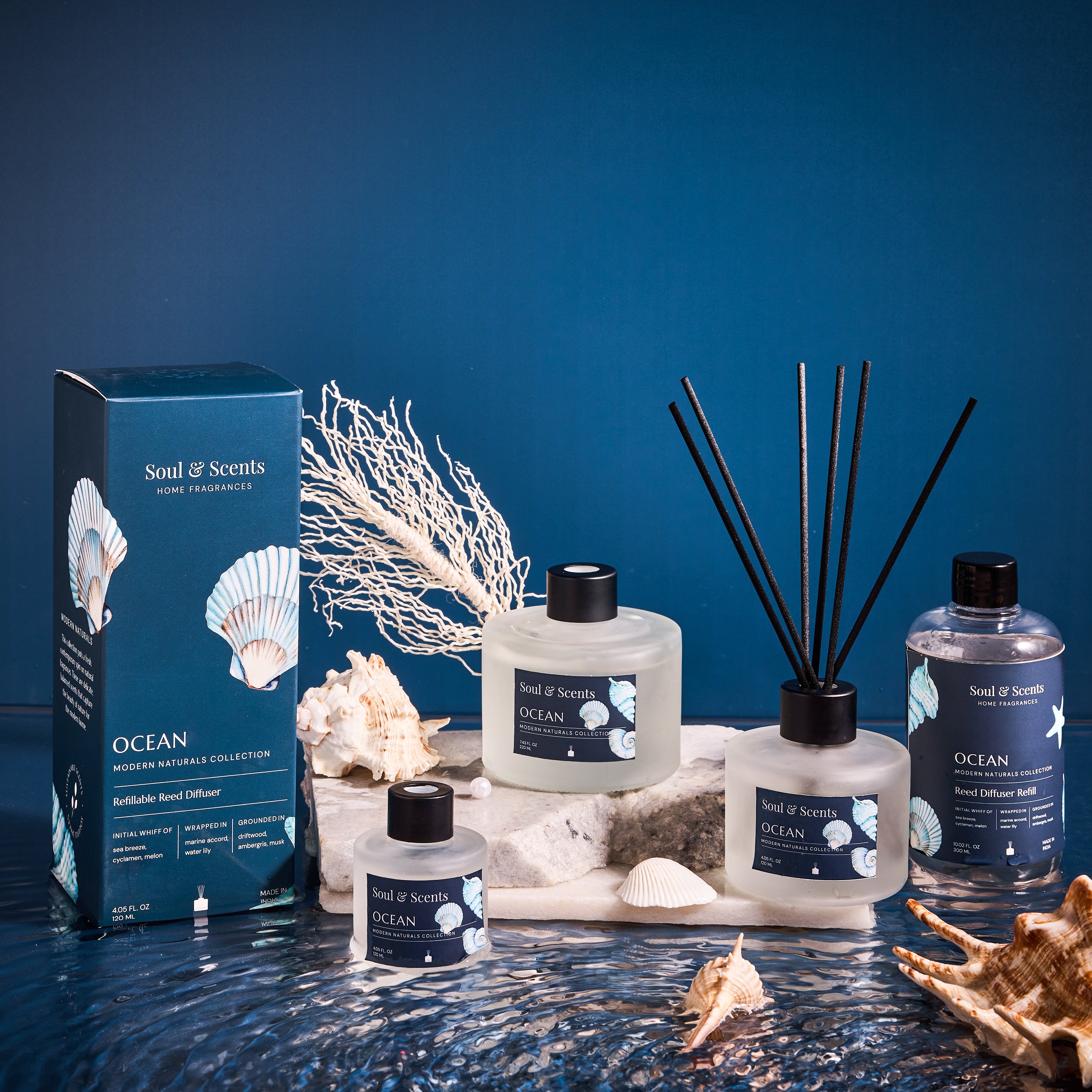Soul & Scents Ocean-themed home fragrance collection with diffusers and packaging on a blue background.